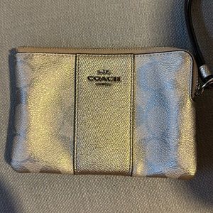 COACH, like new.  SHIMMER gold/champaign zippy.